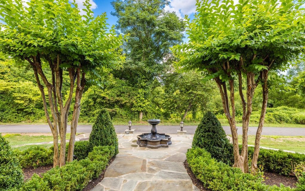 Formal garden and stone fountain at a McLean, Virginia estate