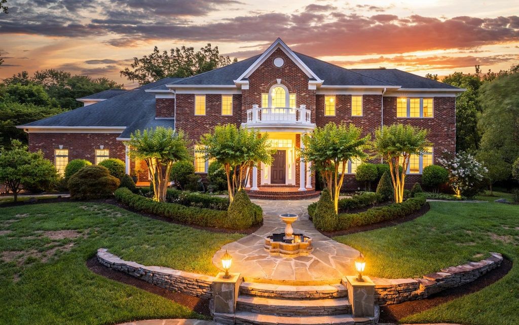 Brick luxury estate at dusk, one of Eileen McNicholas's recent McLean, VA closings