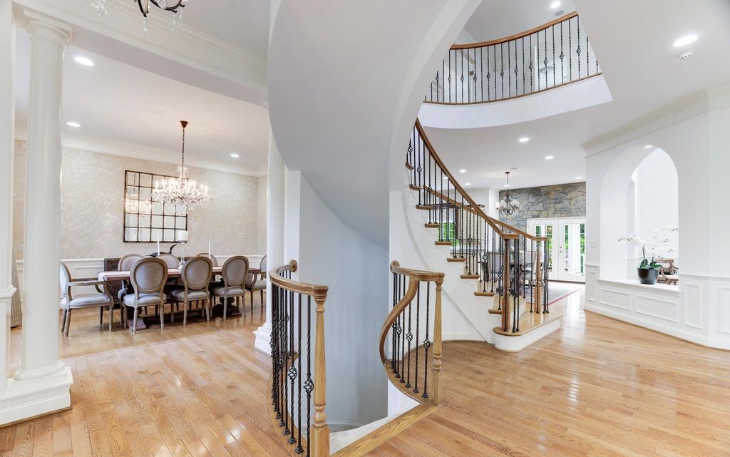 Curved staircase and formal dining room, 6318 Georgetown Pike, McLean, VA